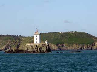 The dramatic coastline protected by L'Ost-Pic lighthouse