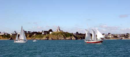 Yachts enjoying the breeze off Saint Quay beach