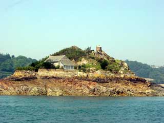 A solitary house perches on Roc'h an Orin in Le Trieux river