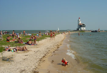 Marken's lighthouse stands guard over the narrow beach