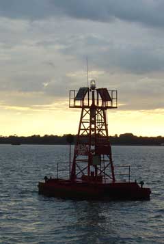 Cutting close in to Calshot Spit