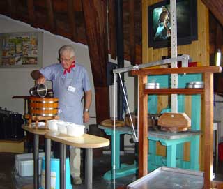 Real live cheese making demonstration complete with overhead cameras