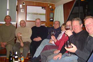 Sharing a well-deserved post-cruise drink with the crews of Rainbow's End and Moon Shadow