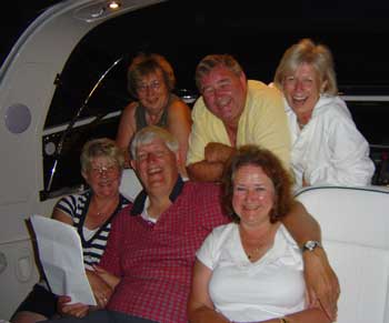 Frank leads the singing on our last night at Ouistreham