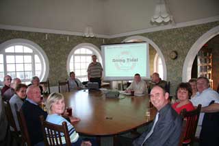 Andy presents "Going Tidal" to the assembled company