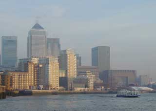 Mist falls over Canary Wharf as we complete our river cruise